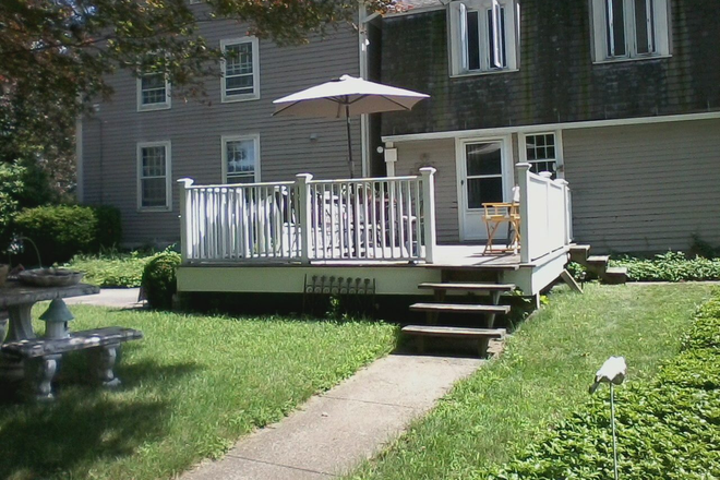 Deck and side entrance - Furnished bedroom & Private Bath in a charming colonial home in a peaceful historic district