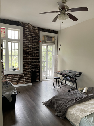 Bedroom - FANTASTIC ONE BEDROOM WITH A SUNROOM RIGHT ON ST CHARLES AVE! Apartments