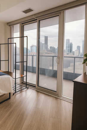 Bedroom - Private rooms in a co-living condo unit at Wellesley St. E, Toronto