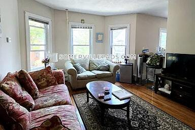 Living Room - NO BROKER FEE! 4 Bed 1 Bath Apartment on Curtis St. in Somerville! Close to Tufts Campus
