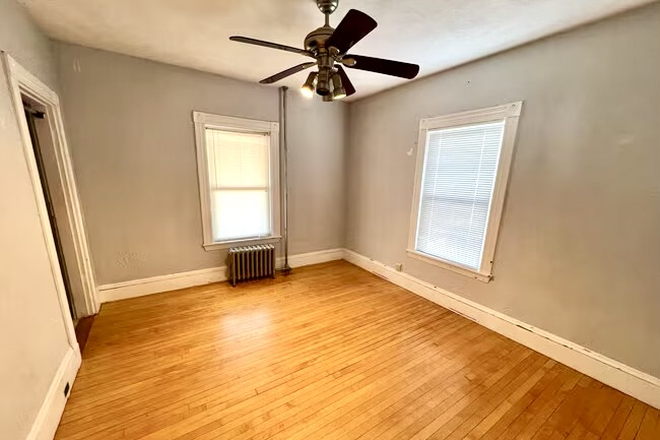 Large floor bedroom - has closet, ceiling fan, sole access to wrap-around porch ($1150) - Oak Square Brighton - 3 bedrooms available Apartments