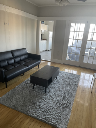Living Room - Still available for September 2024! Great sunny 3 bed off Harvard Ave! Apartments