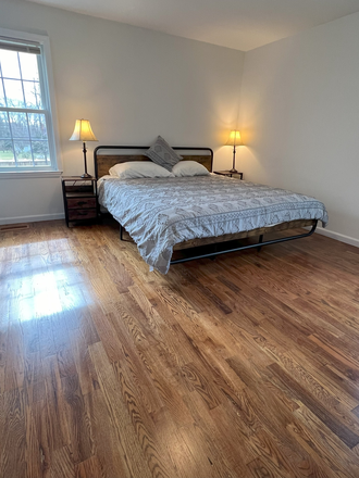 1st Bedroom: king-size bed - Furnished 2BR Suite-Province Line Rd-Princeton Apartments