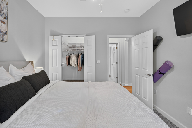 Bedroom and Walk In Closet - Updated 1BR Condo with Pool, Attached Garage & Dog Park