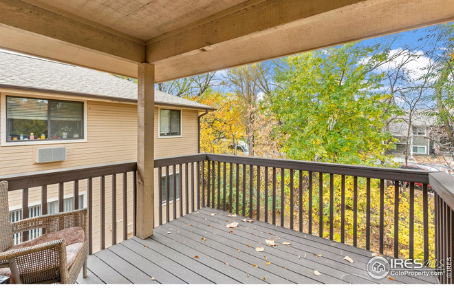 Deck - Condo with private deck surrounded by trees