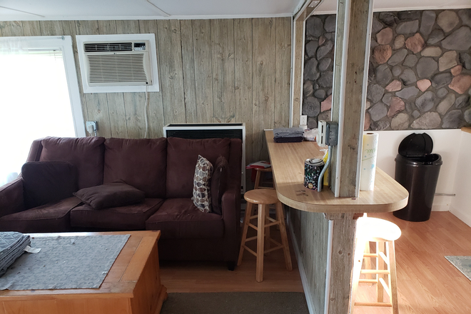 living room kitchen - Breakwater Village House