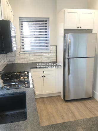 Kitchen - Newly renovated 4 bedroom/2 bathroom on Tremont Street in Mission Hill Apartments
