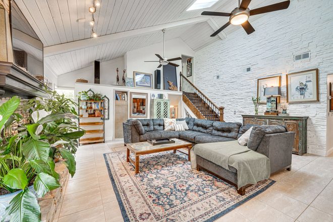 Main living area - Restorative 4BR Retreat: Private Pool, Native Gardens, and Workspace near Universal/Disney House