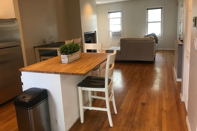 Living room - Large 2B2B next to Blu line T and in the middle of E. Boston action