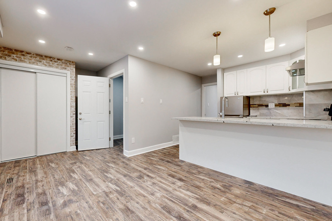 Living Room - Newly Renovated 1-bedroom unit in Morningside area - all utilities incl. Duplex