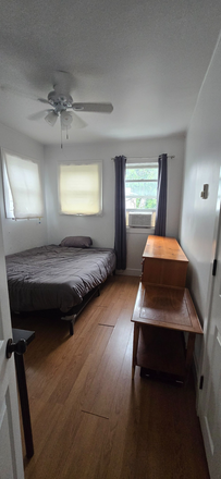 Bedroom pic#1 - Room for Rent in Fully Furnished Rowhouse in Charles Village