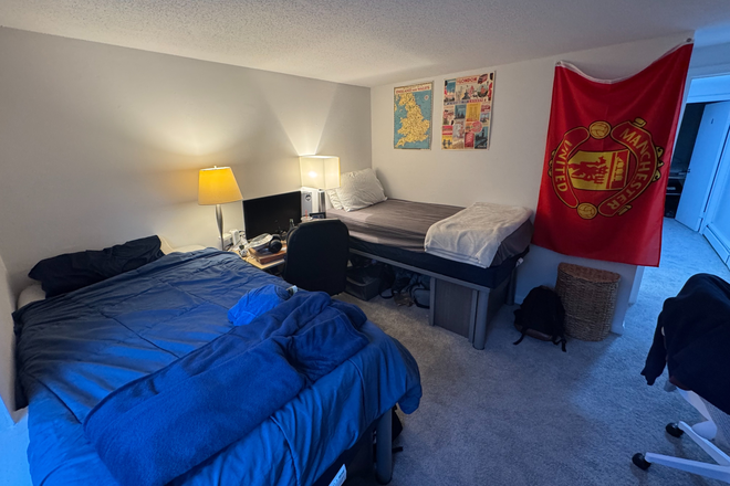 Bedroom - The Den at Cedar Ridge Apartments