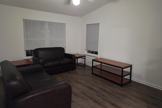 Living Room - The Courtyards 500 – 1 Bed Available in 2 Bedroom Unit Apartments