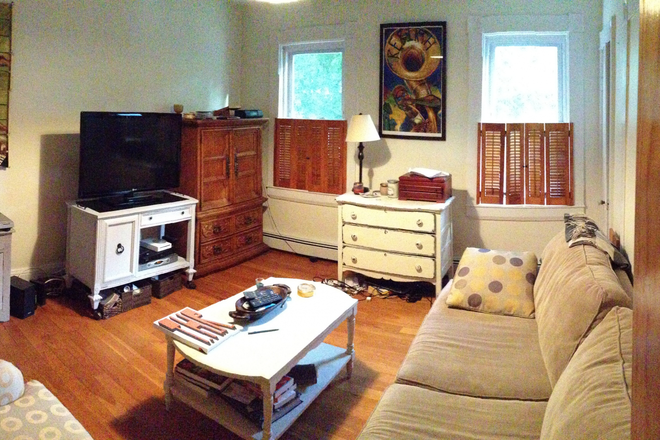 living area - Large 1 BR with separate  study, private porch,eat-in-kitchen,yard,hardwoods,full bath rent $ 1650 Apartments