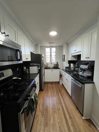 Kitchen - Furnished w/ Utilities Light-Filled Condo in Historic and Walkable Roland Park