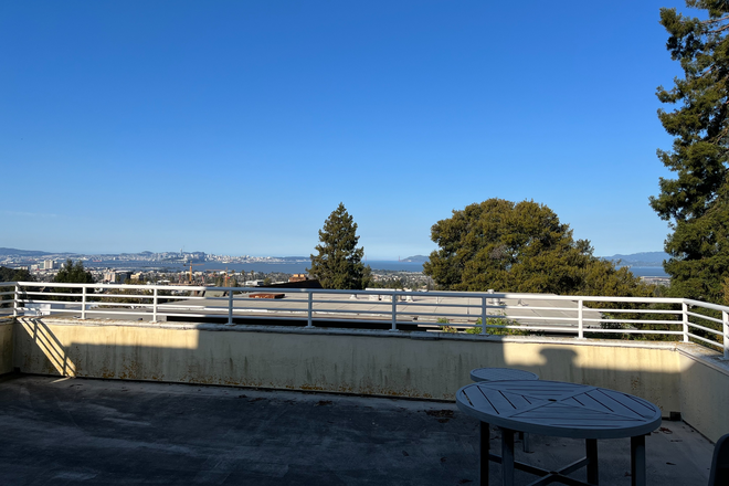 View of SF and Marin from deck - Furnished, large 2 bedroom apt 3 blocks north of campus