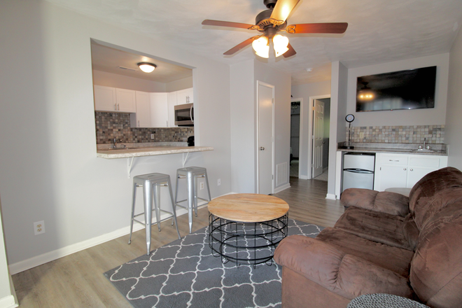 downstairs living room - Camden Townes - 4 bedrooms - 2 bath townhomes for rent
