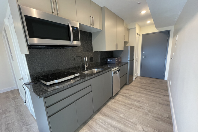 kitchen - Modern and Sunny Allston studio with AC! - for 9/1 Apartments