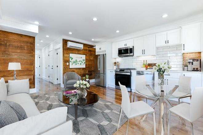 Shared living room + Kitchen - Furnished 1BR + Den | 1.5 Bath | Parking + Utilities Included | Boston Summer Rental (Roxbury) Apartments