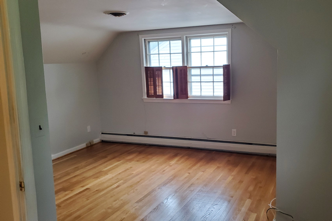 Bedroom (new windows not shown) - Furnished bedroom with Gym and Utilities Included in a Quiet Neighborhood House