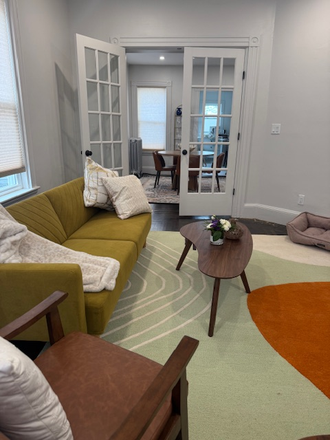 furnished living room with view thru dining room to kitchen - Newly renovated 2+ bedroom, 1.5 bathroom apartment in heart of Forest Hills section of Jamai