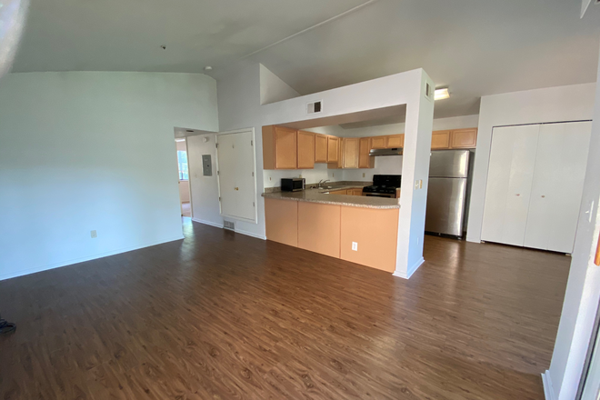 Living room - August Pre-leasing: 2142 Canyon Blvd #203 (MORE UNITS AVAILABLE)