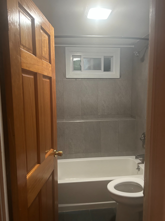 bathroom - Easy and convenient 2 bdrm, 1 bath w/ outdoor patio near MBTA available 7/1 $2,500.00 per month Apartments