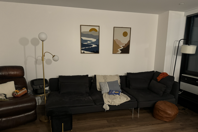 Living room (partial view) - Looking for Roommate at 2BR 1.5BA Duplex Apartments