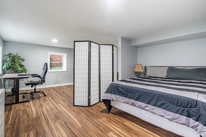 Bedroom - Quite private basements, minutes from ATL Airport House