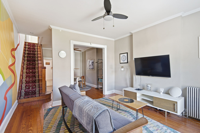 Living Room from doorway - Solar-Powered + Furnished Townhouse w/ All Utilities Included Walking Distance from JHU