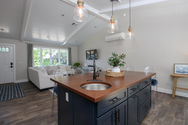 kitchen island - Updated 3BR Home in quiet family beach neighborhood
