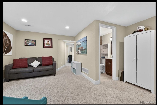 Basement suite: living room - Private Basement Suite in Quiet Shared Home (Parking, Utilities Included)