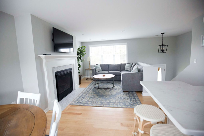 Living Room - Available for a group of 5! Modern split level home!