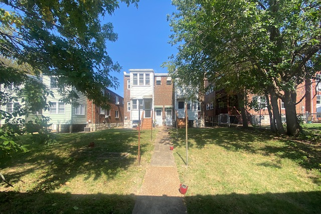 backyard - A large simple 1 bedroom, 1 bath second floor upstairs unit in a four family dwelling. Apartments