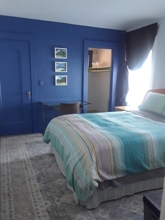 bedroom and walk-in closet - Furnished Rm near Ashby Bart, Berkeley Bowl, Walgreens, and more