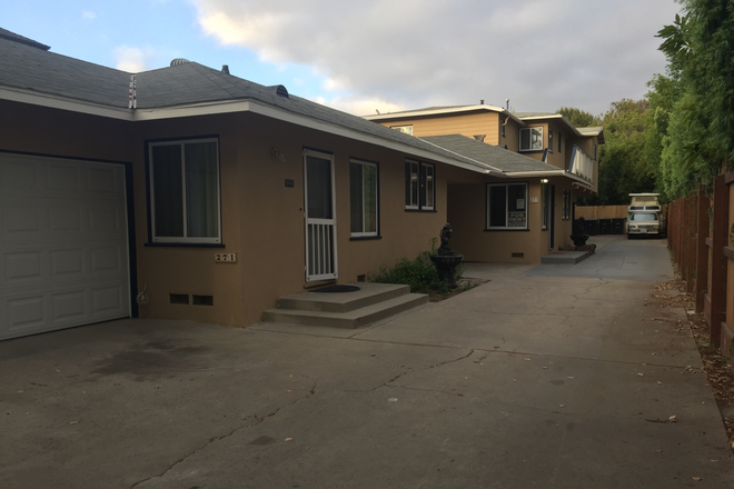 Triplex drive way. - Old Town Circle of Orange Triplex