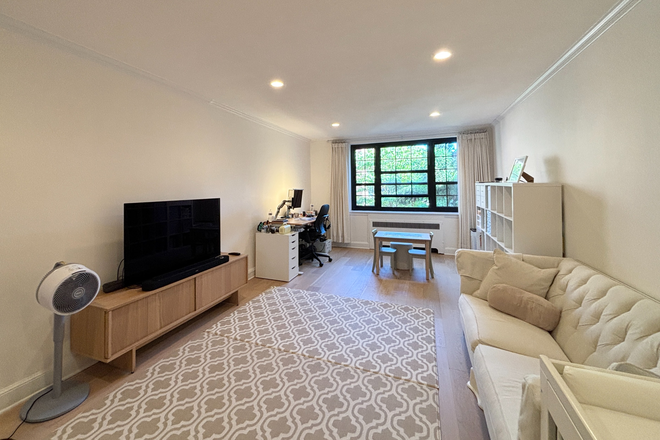 living room - Charming Coolidge Corner 2 bed/2 bath with garage parking for 10/1 - NO FEE! Apartments