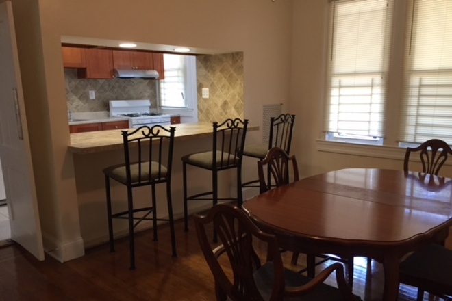 Dining room with breakfast bar - Live affordably, Walk to JHU: Private Room in Quiet 4 BR House
