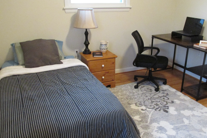 Bedroom with included furniture (pitcher and books not included) - Furnished room for rent In College Park Woods *Utilities Included* House