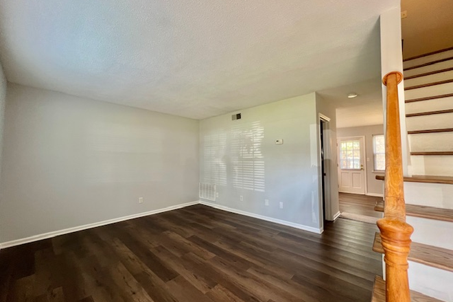 Living room - ☀️ $1,485 — 2-Level 2BR/1.5BA Townhouse Condo near University Place, Available Aug 3,2026