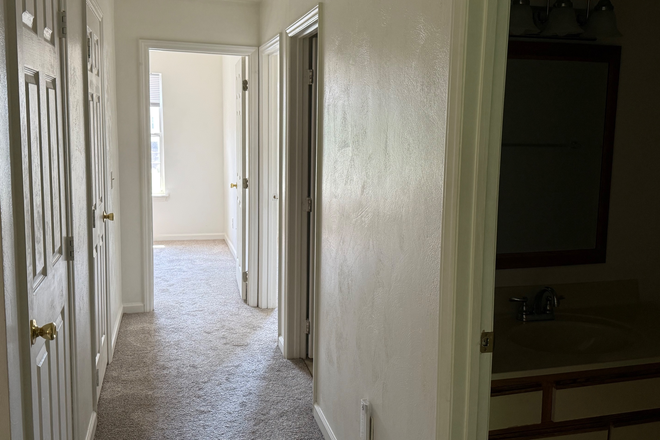 Upstairs hallway by bedrooms - Spacious 4 BR, 3 Bath - Large Townhouse with den