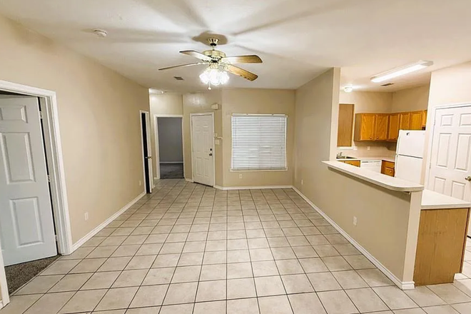 view of living room to front door - 3 Bed, 3 Bath MINUTES from Campus Townhome