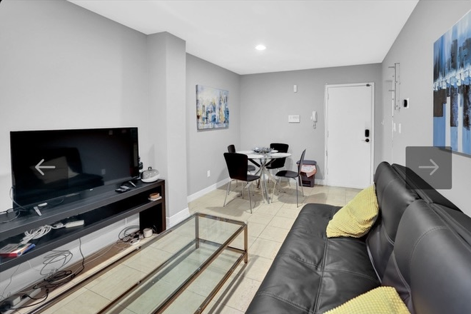Living Room-Dining Area - Furnished 1BR/1BA Sunny Apt with back yard, W/D