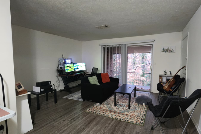 Living room - The Apartments at President Park