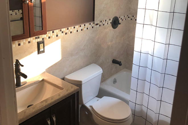 Bathroom - Great value & Close to campus! Brand New Appliances and Furniture! House