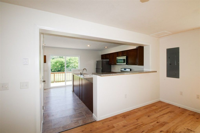 Living room to kitchen - Spacious 3BR 1 Mile to VLS - Quiet, Private Setting Duplex