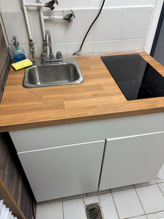 kitchen cooker/sink/storage - Bachelor basement apt, townhouse -Prime location Yorkville/Annex, very bright, utilities incl.