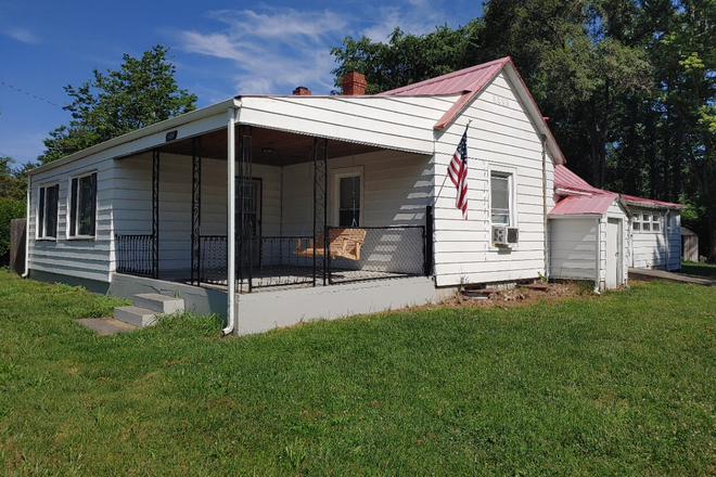 From the road - Porch, deck and large yard - Convenient location House