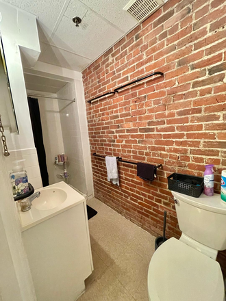 Visit hubrealtyproperties.com - Brookline, Fenway line, basement 3 bedroom 2 bathroom, updated kitchen + bathrooms, private yard Apartments