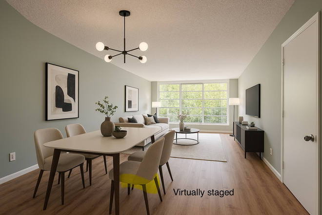 Dining & family room  (virtually staged) - Spacious 2/2 condo in Live Oak at Pine Island Ridge, close to campus